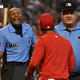 MLB umpire C.B .Bucknor (L) argues with Cardinals’ manager Oliver Marmol.